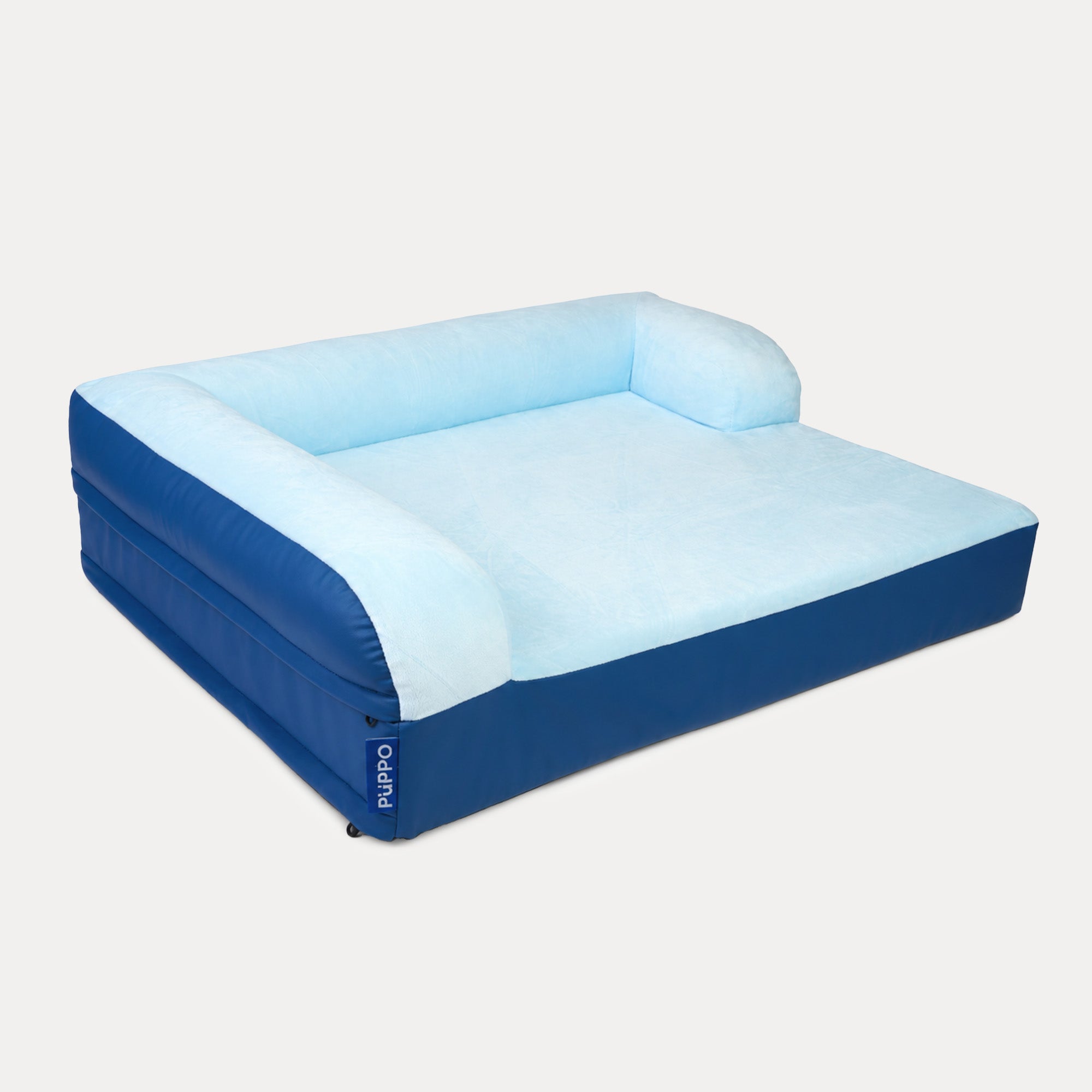 An inflatable pet lounger bed by PUPRO, featuring a light blue plush cushioned top and backrest with a Royal blue inflatable base, shown on a light gray background.
